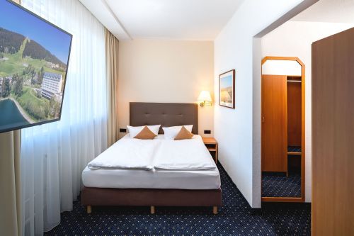 Hotel Motive, Zimmer, Doppelzimmer, Deluxe Zimmer Schlafbereich