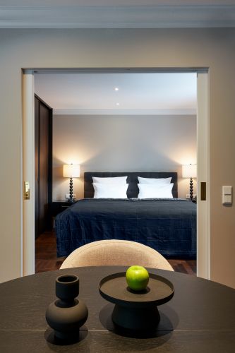 Hotel Motive, Zimmer, Bett Penthouse